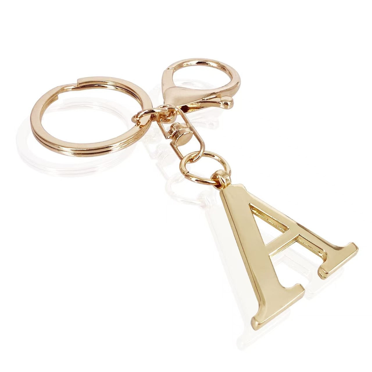 Initial | Charm de bolso elegante en aspecto dorado