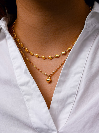 Collar con colgante de corazón de alivio