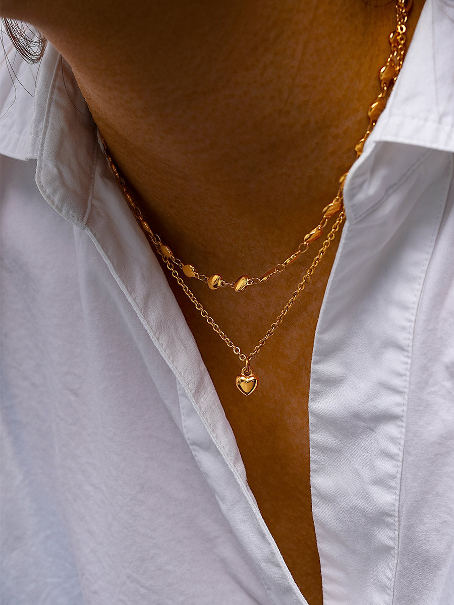 Collar con colgante de corazón de alivio