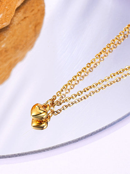 Collar con colgante de corazón de alivio
