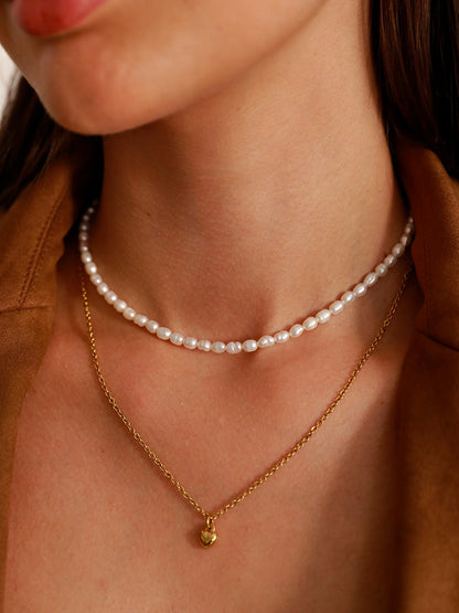 Collar con colgante de corazón de alivio